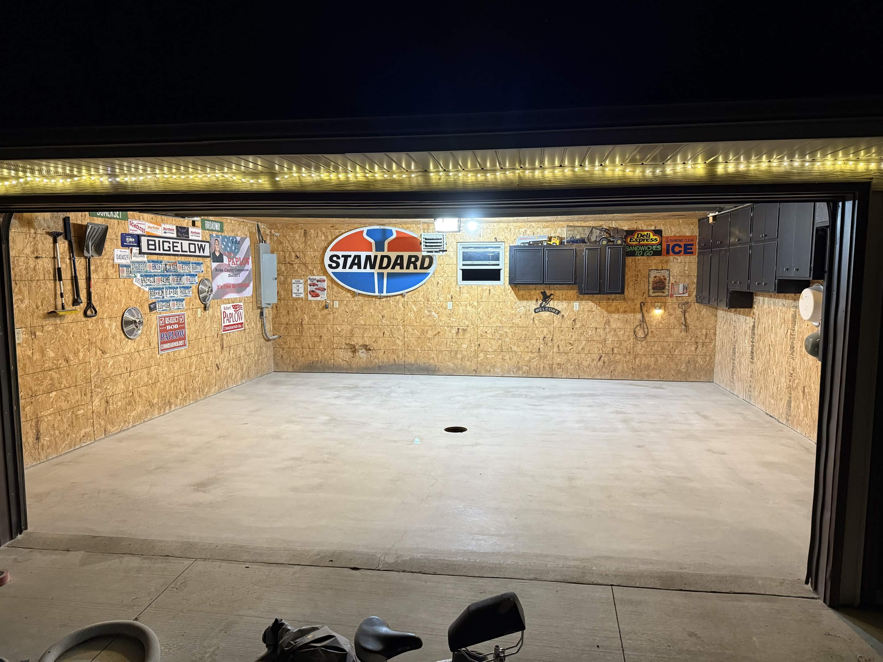 Bare concrete garage β before