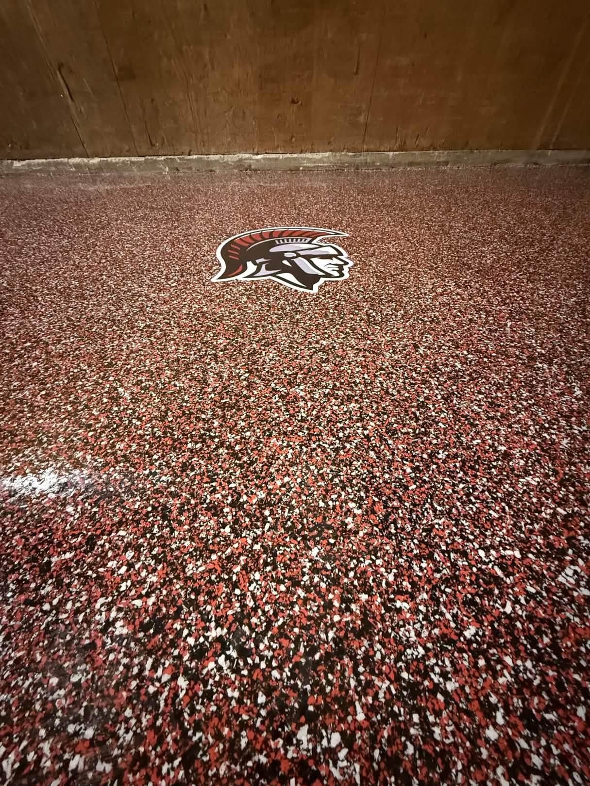 Custom logo embedded in epoxy floor