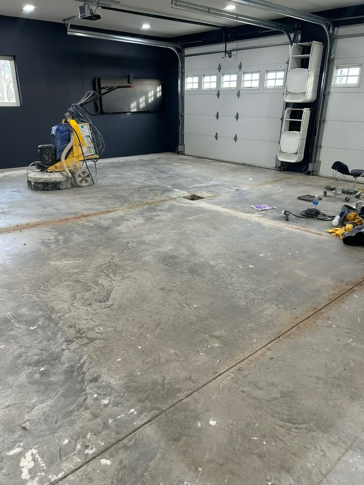 Dark garage β bare concrete before coating